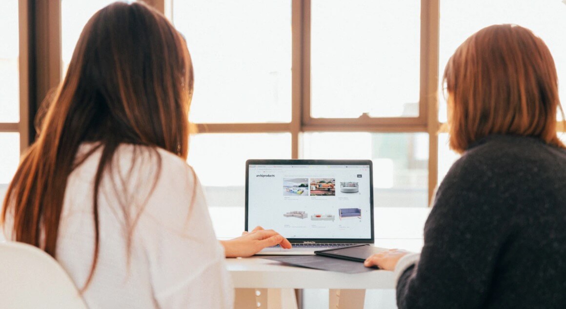 Stock Image of Bloggers Looking at a Website