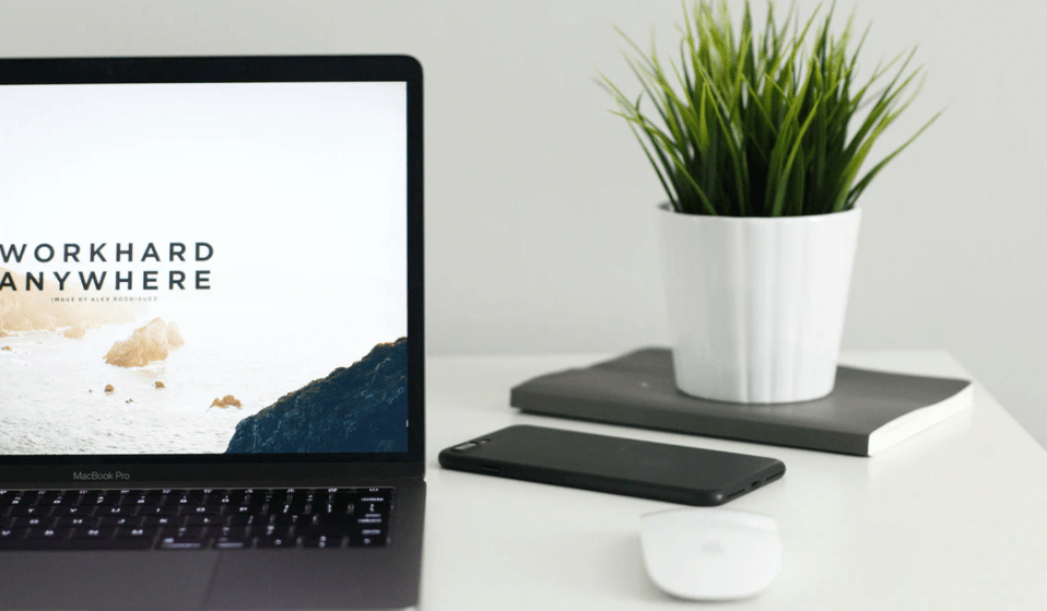 Stock Image of Working on Blog Posts (MacBook on a Desk)